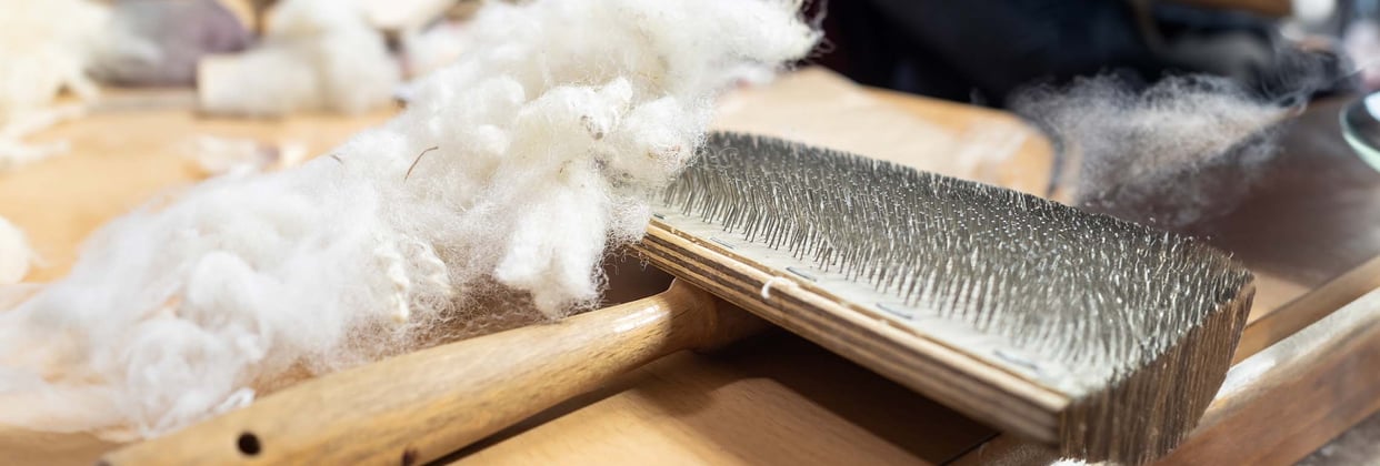 A hair brush covered in fur