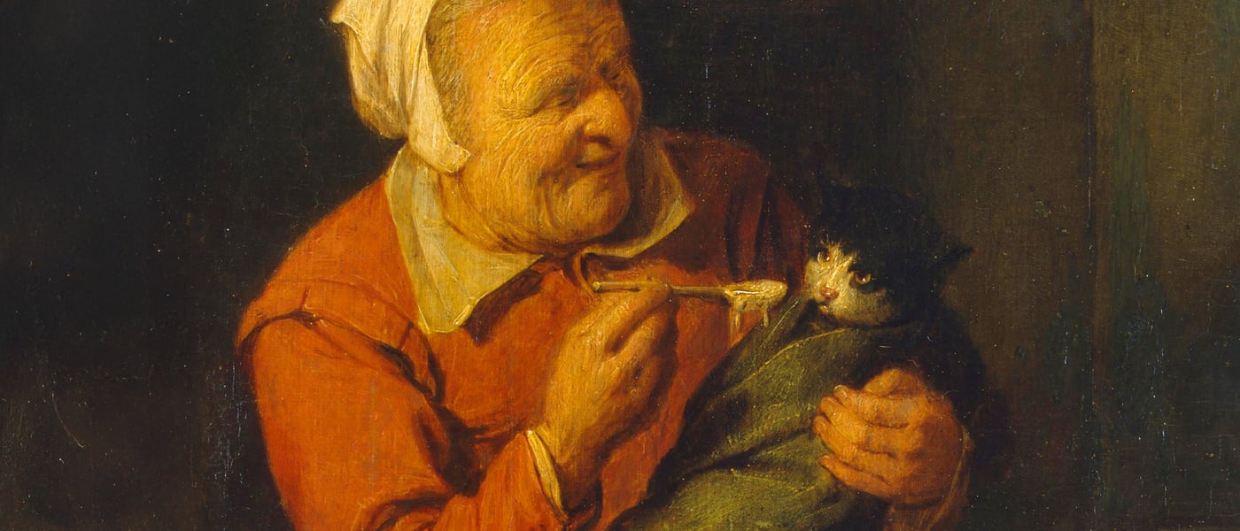 A painting of an old peasant woman feeding a cat with a spoon.