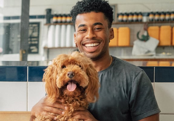 pet insurance customer with their dogs