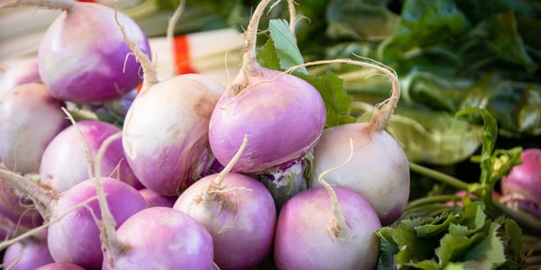 a close up of purple turnips