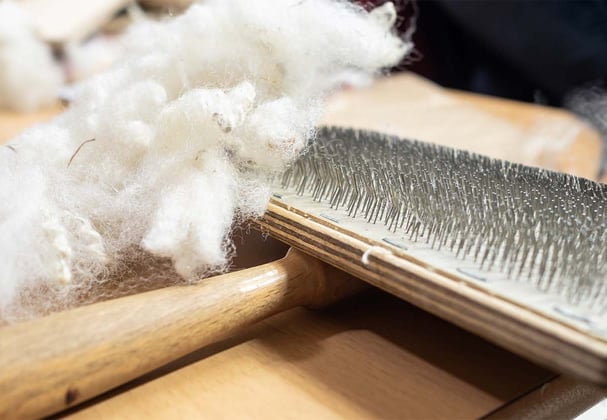 A hair brush covered in fur