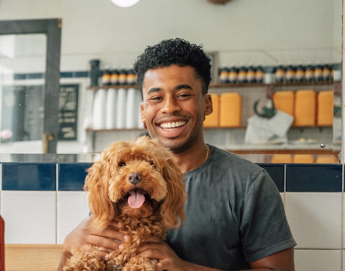 pet insurance customer with their dogs