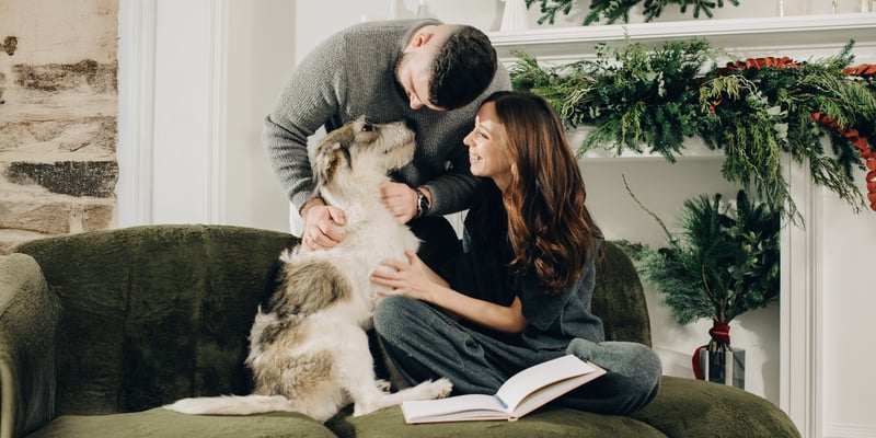 A couple with their big dog.