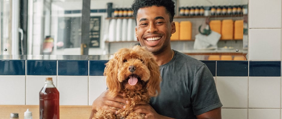 pet insurance customer with their dogs